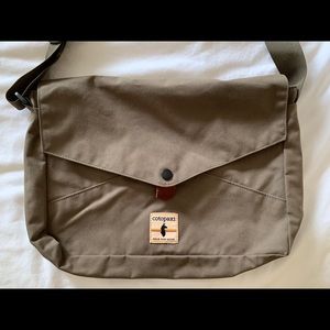Cotopaxi olive laptop messenger bag